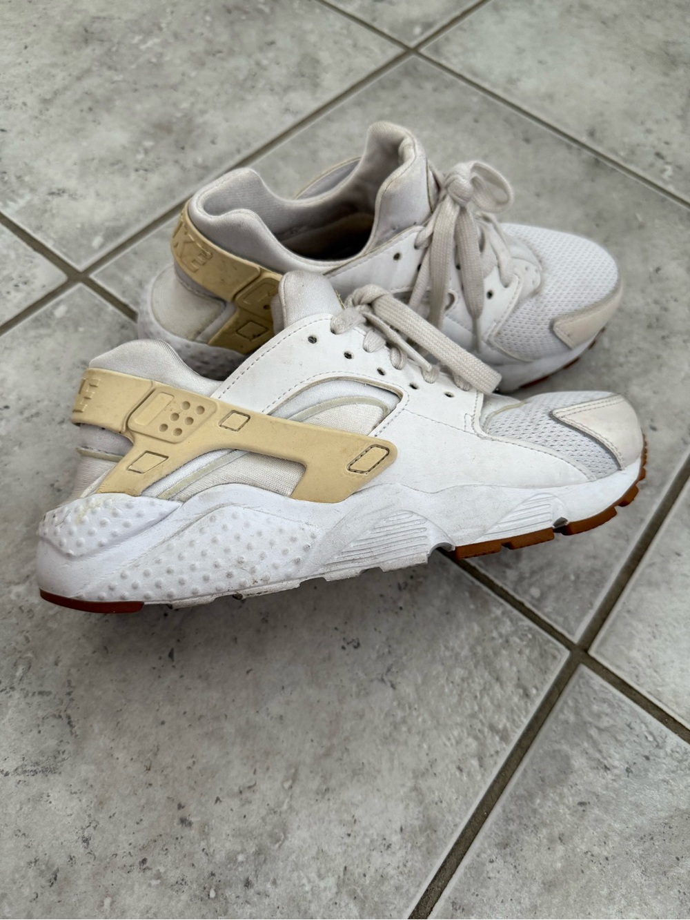Women’s Nike White and Tan Air Huarache Sneakers
